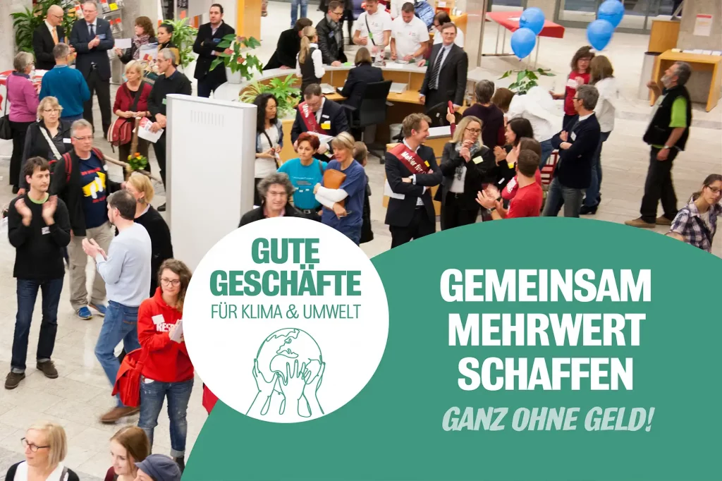 Menschen auf der Unternehmensmesse gute Geschaefte fuer Klima und Umwelt