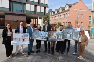 Gruppenfoto der Entscheider und Akteure der Marketingkampagne "Kassel - Wo Zukunft Raum hat"